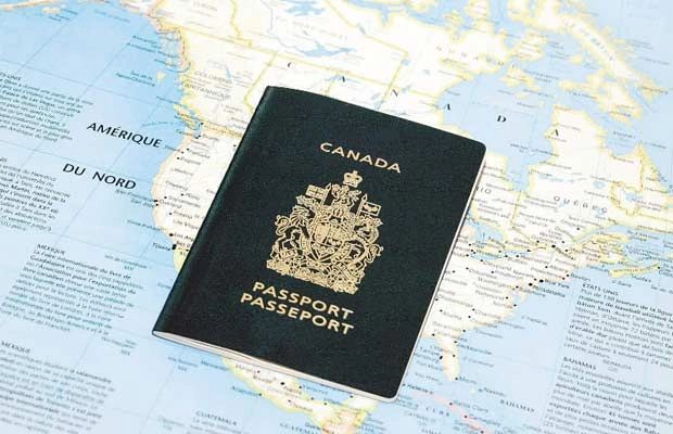 Canadian passport on a world map